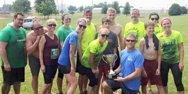 Grinnell Regional Medical Center was awarded the Grinnell Games Company Challenge traveling trophy last weekend. Members of their team accepted the trophy at the conclusion of the games. Those pictured include (front row, l-r) Sherry Baker, Danielle Messico, Megan Jensen, Robert Groves, Chad Nath, Andrew Cogley, Jessica Kite; (back row, l-r) Jarrod Diehm, Dennis Lowry, Jamie McClenathan, Cody Jensen, Seth Signs, Dr. Patrick Cogley, Grace Diehm.