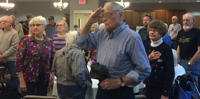 While Pianist Jolene Jones played music from each branch of the military, attendees stood for the branch they or a loved one had served – those standing represented the Army.